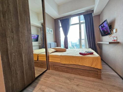 Billede fra billedgalleriet på Kuro House At Tree Park City i Kebonnanas