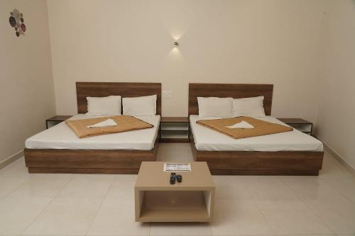 Krevet ili kreveti u jedinici u objektu Highest Peak in Yercaud- Zeenus Abode Resort