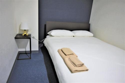 Postel nebo postele na pokoji v ubytování Hotel Links Dobutsuenmae