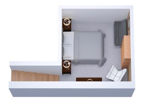 - une vue de tête sur une petite chambre avec un lit dans l'établissement La Ferme du Nant - Portes du Soleil, à La Chapelle-dʼAbondance