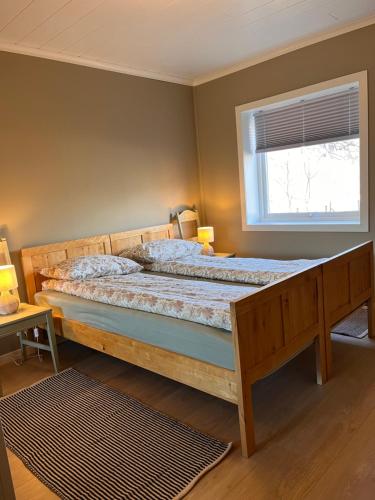 Säng eller sängar i ett rum på Cozy house in Eidfjord