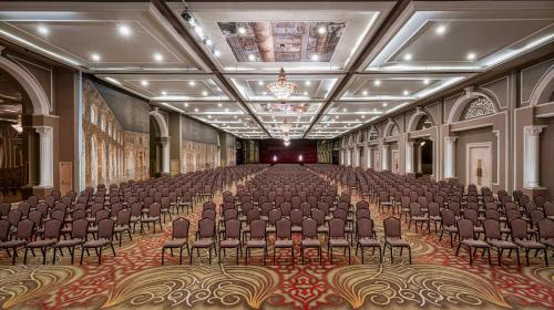 an empty hall with chairs in a large room at Kaya Izmir Thermal & Convention in Izmir