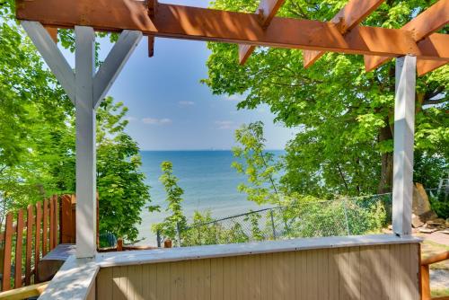 a view of the ocean from a pergola at Turtle Cove Bay Beach House about 13 Mi to Buffalo! in Lake View