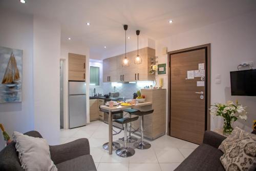 Kuchyň nebo kuchyňský kout v ubytování Hadrian by Heloni Apartments
