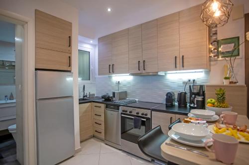 Kuchyň nebo kuchyňský kout v ubytování Hadrian by Heloni Apartments