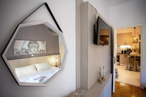 Kuchyň nebo kuchyňský kout v ubytování Hadrian by Heloni Apartments