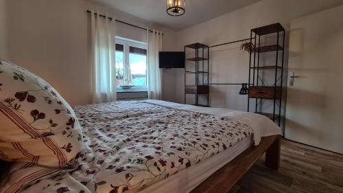 Katil atau katil-katil dalam bilik di Ferienwohnung Asmuss in Rabenholz