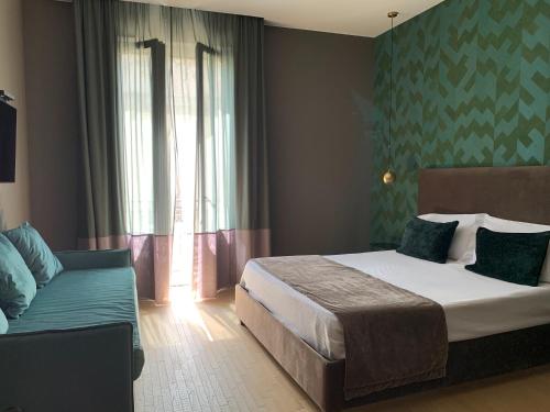 Ένα ή περισσότερα κρεβάτια σε δωμάτιο στο Re Sale Boutique Hotel