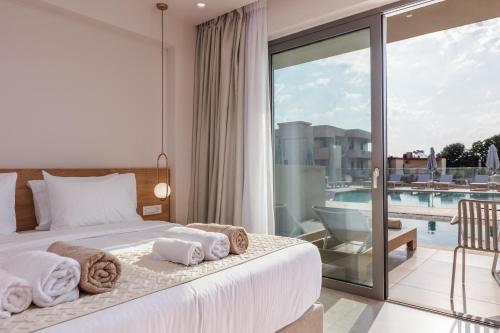 Кровать или кровати в номере Nima Boutique Hotel