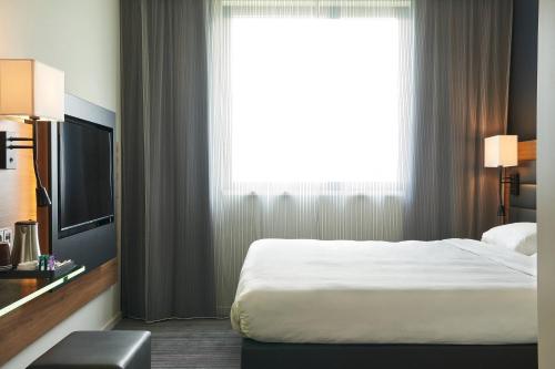 Televisyen dan/atau pusat hiburan di Moxy Frankfurt Eschborn