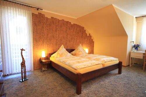 Postel nebo postele na pokoji v ubytování Gasthof Müller