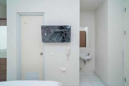 Koupelna v ubytování Mroom Residence near UMN Gading Serpong RedPartner