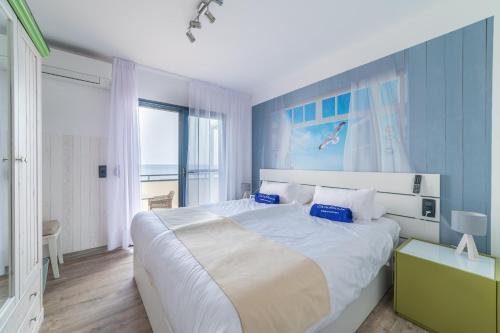 Giường trong phòng chung tại Casablanca Fuerteventura La Lajita Suites