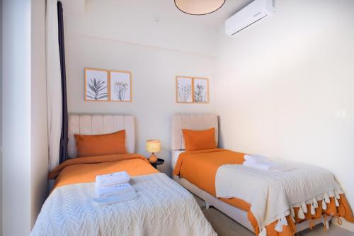 Postel nebo postele na pokoji v ubytování New Inn Hotel Cadde 54 Mall