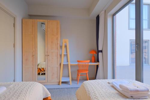 Postel nebo postele na pokoji v ubytování New Inn Hotel Cadde 54 Mall