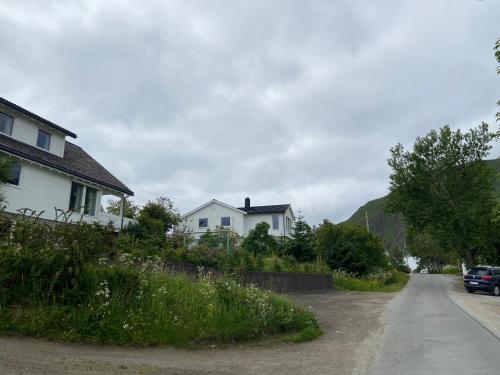 a house on the side of a road at Lofoten Overnatting - Ballstad in Ballstad