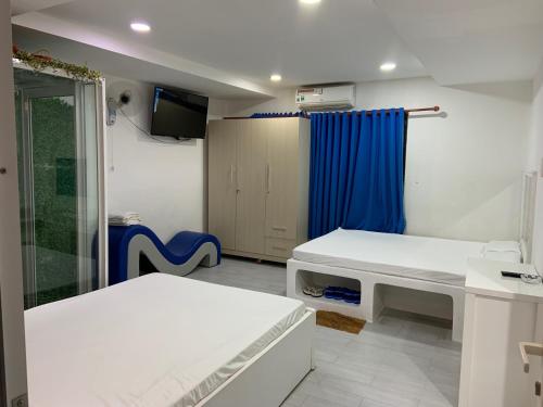 Postel nebo postele na pokoji v ubytování Hotel MAI TUAN Chánh Môn A