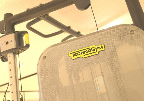 a sticker on the back of a white chair at Oriental Hotel Fukuoka Hakata Station in Fukuoka