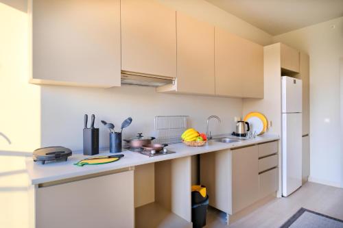 Kuchyň nebo kuchyňský kout v ubytování New Inn Hotel Cadde 54 Mall