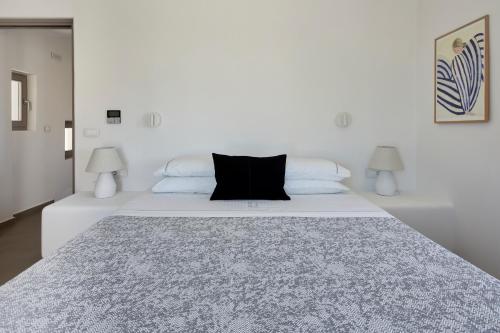 Ένα ή περισσότερα κρεβάτια σε δωμάτιο στο Myst Boutique Hotel