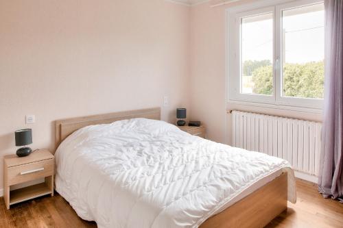 Katil atau katil-katil dalam bilik di Calme, plage et patrimoine a Plovan