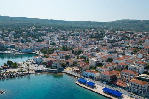 an aerial view of a town next to a body of water at Katina's Coastal Oasis in Pylos