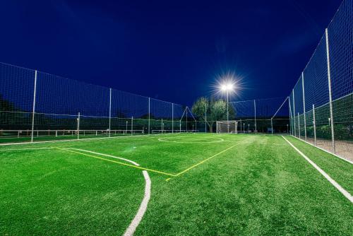 an empty soccer field at night at Fracanzana Hotel in Montebello Vicentino