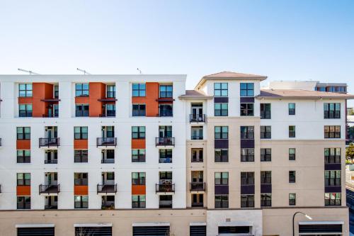 a facade of a building with colorful windows at Redwood City 2BR w WD Pool BBQ nr Caltrain SFO-506 in Redwood City