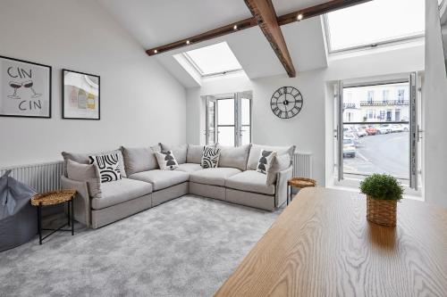 a living room with a couch and a table at Host & Stay - 2 The Mount in Whitby