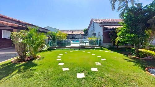 Taman di luar Village Itaúna Inn - Casas de Temporada para Famílias