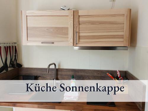 Kuchyňa alebo kuchynka v ubytovaní Wohnung Sonnenkappe