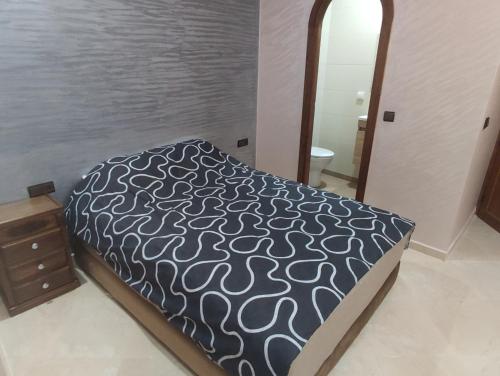 Ένα ή περισσότερα κρεβάτια σε δωμάτιο στο Ocean Guest House