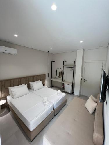 Postel nebo postele na pokoji v ubytování Astoria Rooms