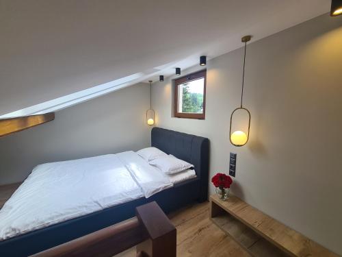 Postel nebo postele na pokoji v ubytování CASA FLORESCU