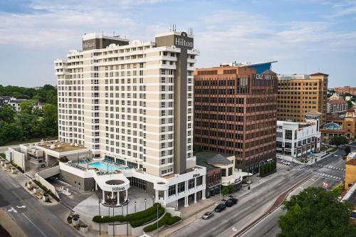 an aerial view of a large white building in a city at Hilton Kansas City Country Club Plaza in Kansas City