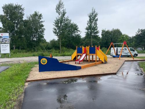 a park with a playground with a play equipment at Uhiuus Mai tänava korter in Pärnu