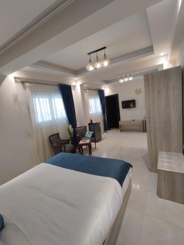 Postel nebo postele na pokoji v ubytování Jewel Plaza Hotel
