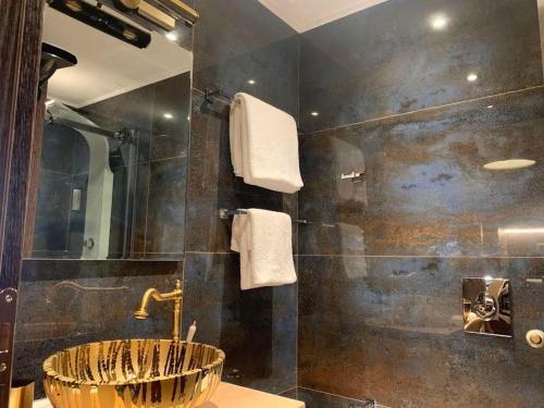 Un baño de MARGARITA'S SUITES