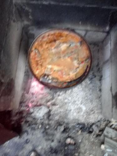 a plate that is sitting on the ground at Casa orizont in Sulina
