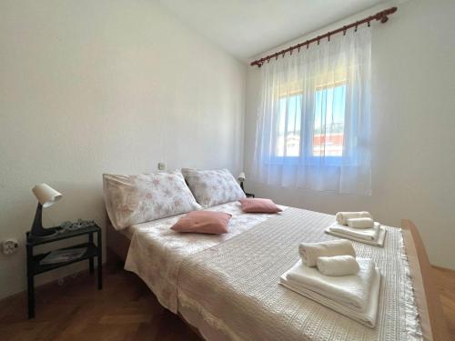 Posteľ alebo postele v izbe v ubytovaní Apartment Troisa