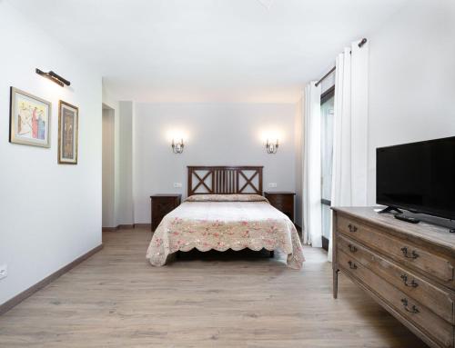 Apartamentos Viña Olivanにあるベッド