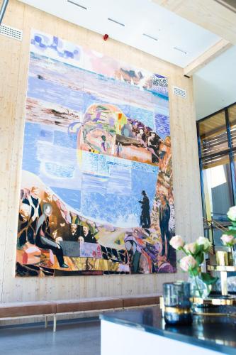a large painting on a wall in a store at RS Noatun in Horten