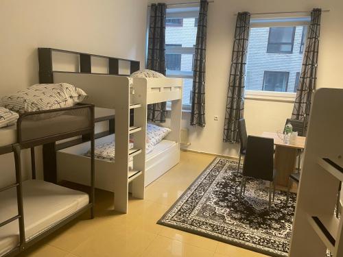 Cityapartment bei Hauptbahnhof emeletes ágyai egy szobában