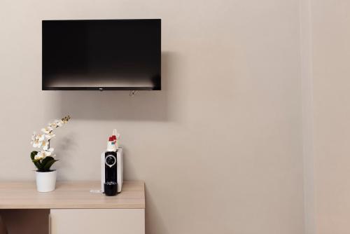 Μια τηλεόραση ή/και κέντρο ψυχαγωγίας στο Gli Appartamentini del Bistrot dei Vinai