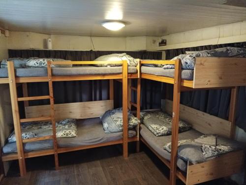 a group of bunk beds in a room at Mobilheim in Mohelno