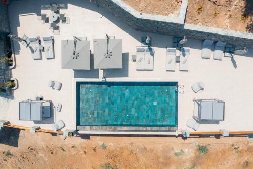 an overhead view of a swimming pool on a building at Sigma Residences Boutique Hotel in Exámbela