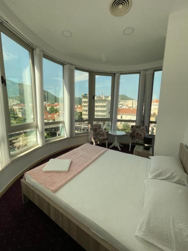 Postel nebo postele na pokoji v ubytování Lux Apartments