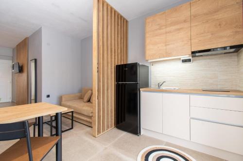 Η κουζίνα ή μικρή κουζίνα στο Unique Aura Luxury Studios