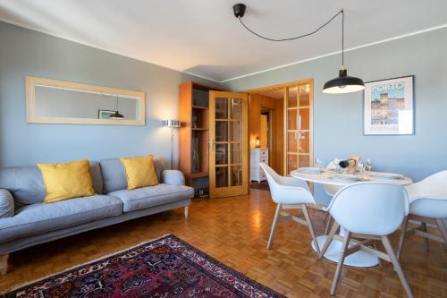 a living room with a couch and a table at Host Wise - Fantastic Peaceful Flat in Gaia in Vila Nova de Gaia