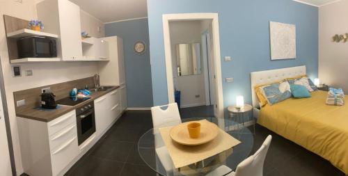Kuchyň nebo kuchyňský kout v ubytování Bloom Apartment